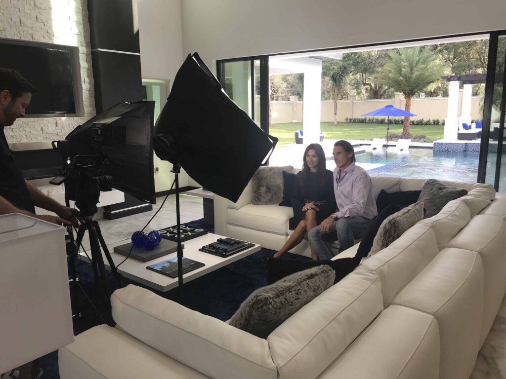 The Design Tourist and the home's builder Jorge Ulibarri on set filming a tour of the Florida Modern custom residence. For more, subscribe to the youtube.com/thedesigntourist