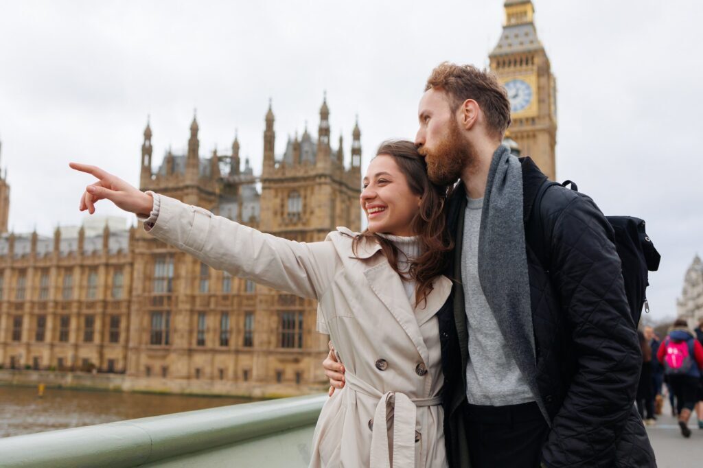 Young couple looking at famous places in London