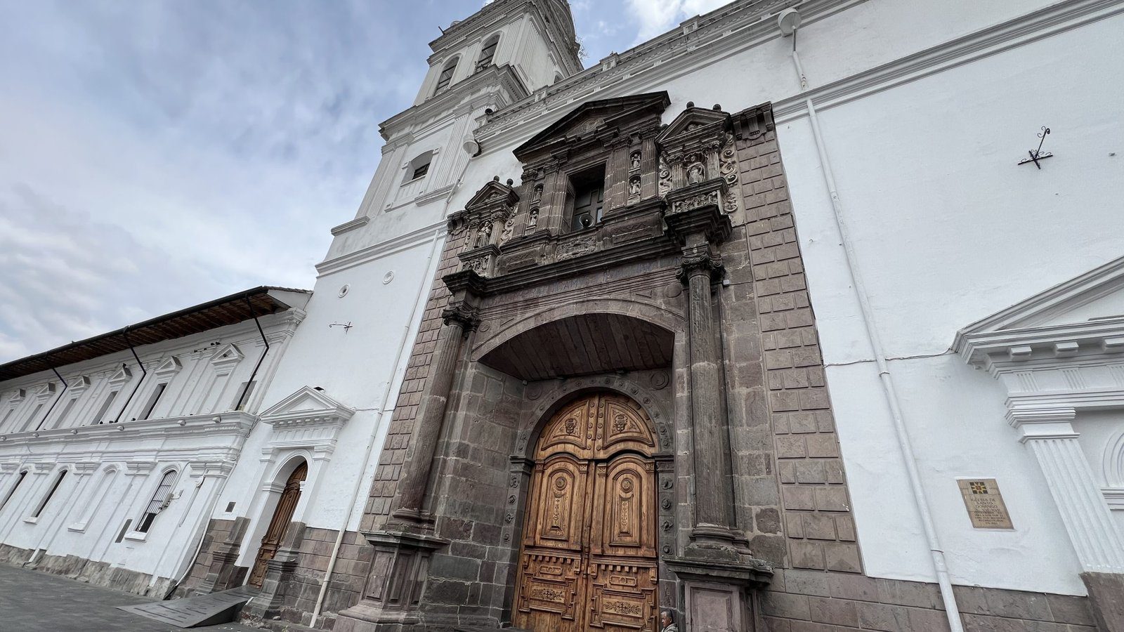 Baroque stone entrance and bell tower of the San Diego Convent in Quito, Ecuador