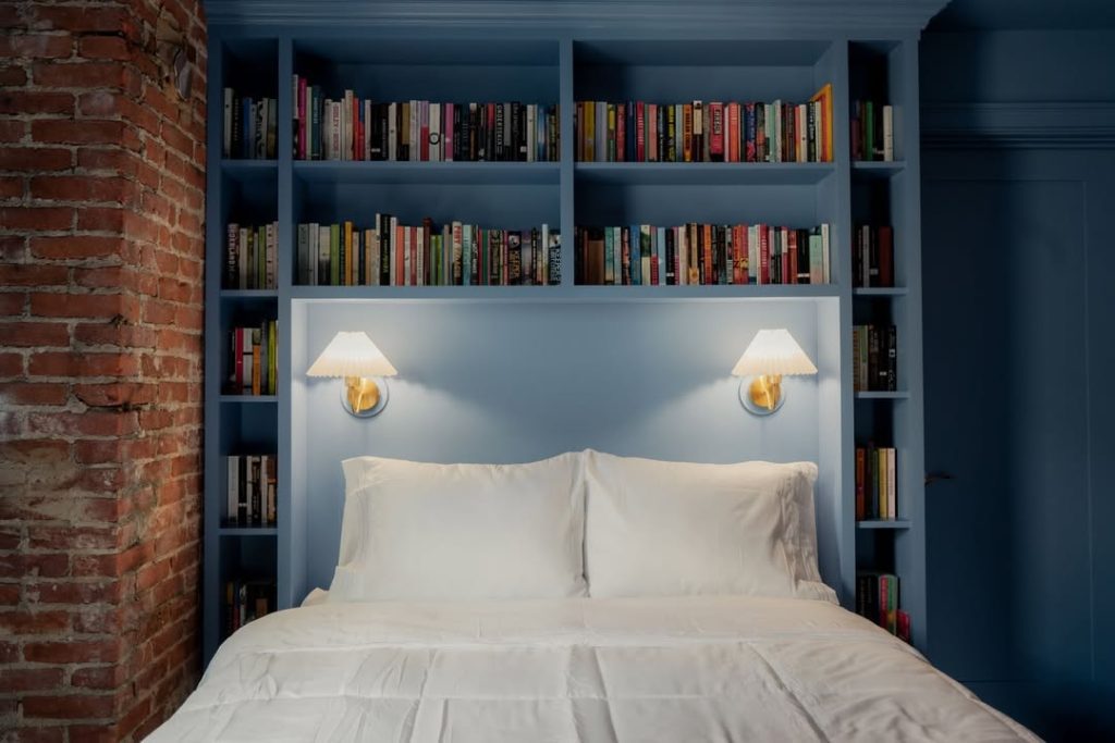 Literary-themed suite at The Bookhouse Hotel in Kennett Square, part of Brandywine Valley’s best bookstores experience, where guests can sleep surrounded by books.